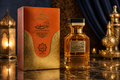 Abyat Layla Sharqiya Eau de Parfum frasco ámbar dorado con caja naranja dorada y linternas árabes